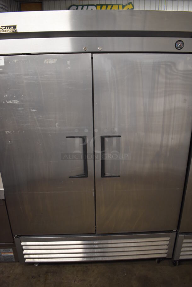 2013 True T49F ENERGY STAR Stainless Steel Commercial 2 Door Reach In Freezer on Commercial Casters. 115 Volts, 1 Phase. 54x30x83. Tested and Working!