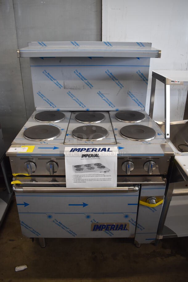 BRAND NEW SCRATCH AND DENT! Imperial Range Pro Series IR-6-E Stainless Steel Commercial Electric Powered 6 Round Plate Range w/ Oven, Over Shelf and Back Splash. 240 Volts, 3 Phase. - Image 1 of 10