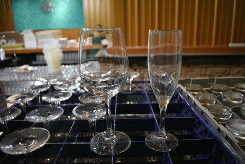 19 Various Stemmed Glasses in Dish Caddy. Includes 3x3x8. 19 Times Your Bid! (bar)