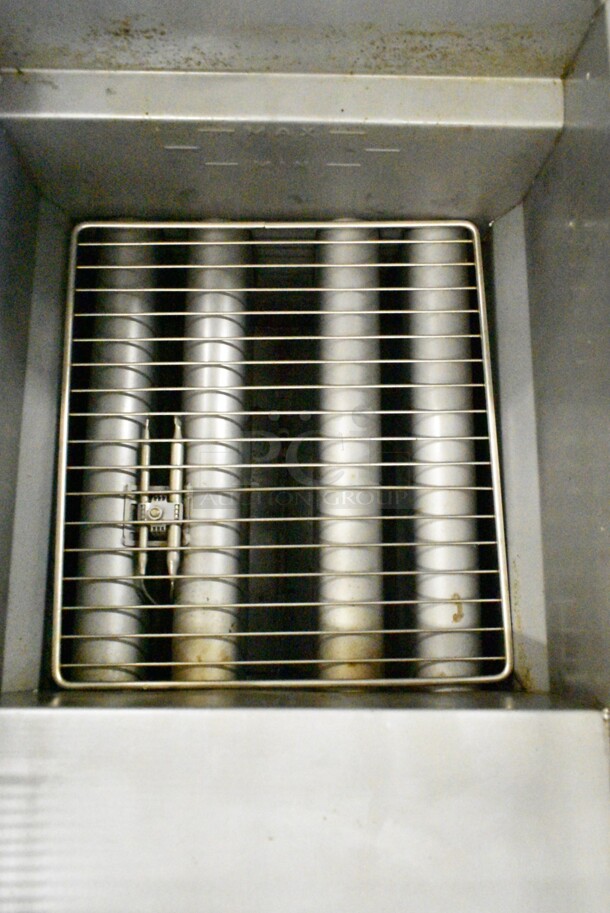 2022 Sierra FRYSTAR500 Stainless Steel Commercial Floor Style Natural Gas Powered Deep Fat Fryer w/ 2 Metal Fry Baskets on Commercial Casters.  - Image 5 of 7