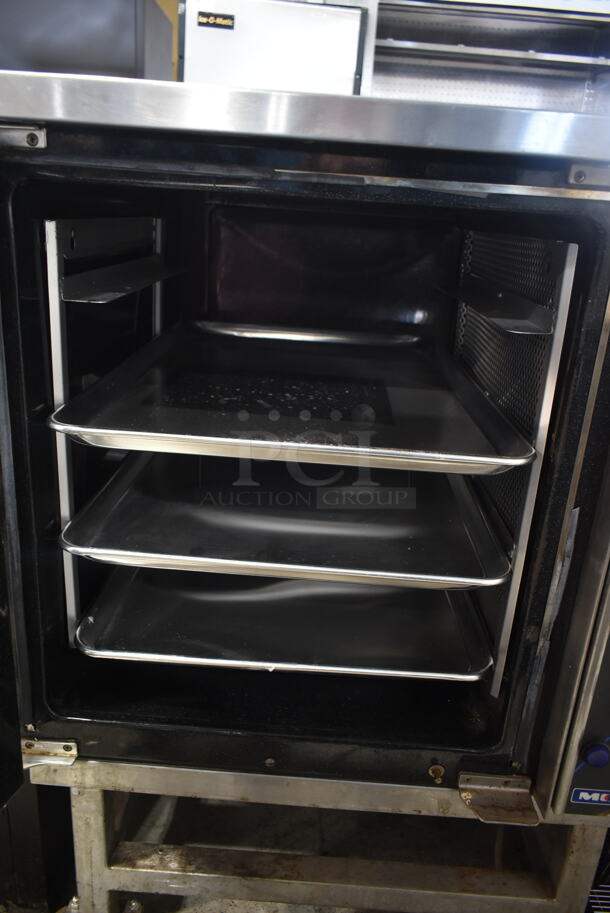 Moffat Turbofan E32MS Stainless Steel Commercial Full Size Electric Touch Screen Convection Oven with Steam Injection on Equipment Stand w/ Commercial Casters 220-240 Volts.  - Image 6 of 7