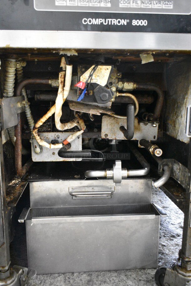 Henny Penny 600C Stainless Steel Commercial Floor Style Natural Gas Powered Pressure Fryer on Commercial Casters. 80,000 BTU.  - Image 8 of 9