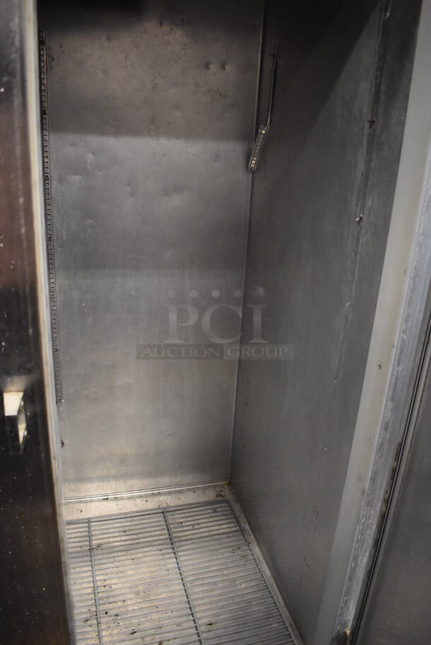 Continental 2F Stainless Steel Commercial 2 Door Reach In Freezer w/ Poly Coated Racks on Commercial Casters. 115 Volts, 1 Phase. 52x34x82. Tested and Powers On But Does Not Get Cold - Image 4 of 6