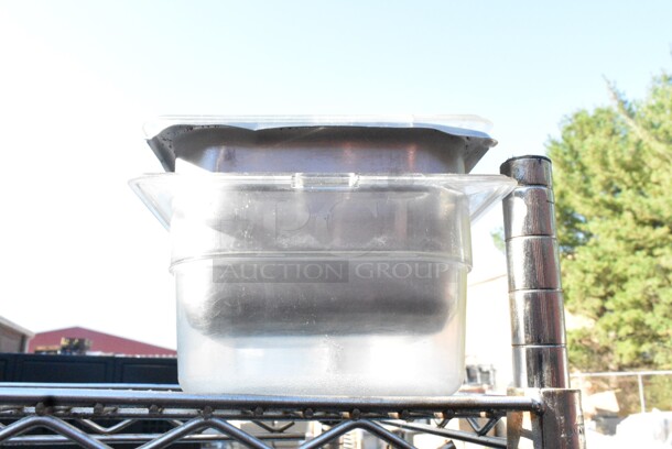 Chrome Finish 5 Tier Wire Shelving Unit on Commercial Casters w/ Contents Including Metal Baking Pans, Basket. Missing Wheel. BUYER MUST DISMANTLE. PCI CANNOT DISMANTLE FOR SHIPPING. PLEASE CONSIDER FREIGHT CHARGES. - Image 4 of 8