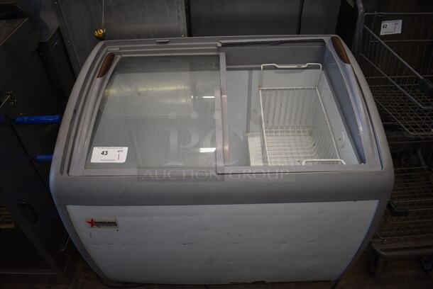 Omcan Model XS-260YX Metal Commercial Chest Freezer Merchandiser on Commercial Casters. Glass Pane Missing and Damage on One Lid. 115 Volts, 1 Phase. 39x27x35. Tested and Working!