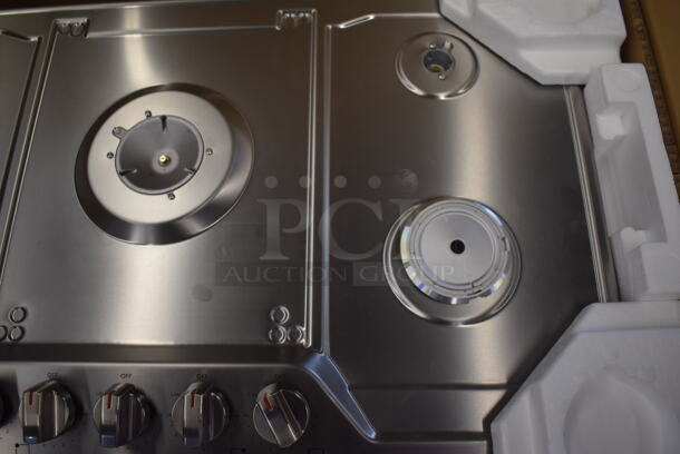 BRAND NEW SCRATCH AND DENT! Frigidaire Electrolux FCCG3627AS Stainless Steel Drop In 36" Gas Powered 5 Burner Cooktop Range. Stock Picture Used For Gallery Picture. - Image 8 of 10
