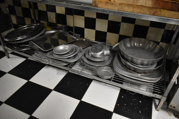 Chrome Finish 4 Tier Wire Shelving Unit w/ Contents Including Poly Bins and Metal Bowls. BUYER MUST REMOVE: BUYER MUST DISMANTLE. PCI CANNOT DISMANTLE FOR SHIPPING. PLEASE CONSIDER FREIGHT CHARGES. (kitchen #2) - Image 5 of 5