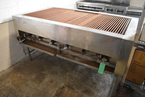 Stainless Steel Commercial Natural Gas Powered Charbroiler Grill on Metal Legs. 71x42x37.5