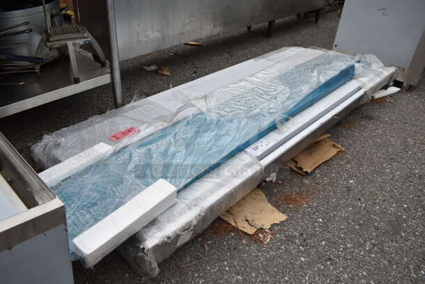 BRAND NEW SCRATCH AND DENT! Regency 600TSB3072S 30" x 72" 16-Gauge Stainless Steel Commercial Work Table with 4" Backsplash and Undershelf - Image 3 of 5