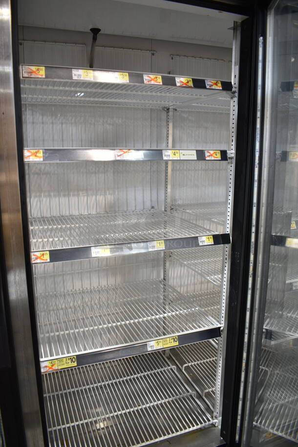 2015 True GDM-72F-LD ENERGY STAR Metal Commercial 3 Door Reach In Freezer Merchandiser w/ Poly Coated Racks on Commercial Casters. 115/208-240 Volts, 1 Phase. Tested and Working! - Image 5 of 7