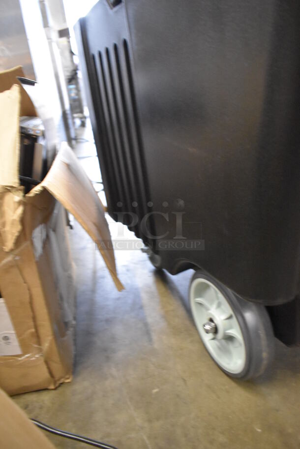 BRAND NEW! Choice Black Poly Portable 125 Pound Capacity Ice Bin on Commercial Casters. 23x32x29 - Image 6 of 6