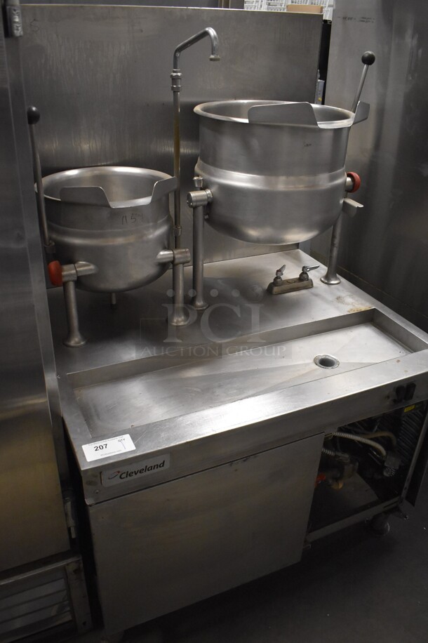 2011 Cleveland 42GMK612300 Stainless Steel Commercial Floor Style Natural Gas Powered Tilting Kettle Station w/ KDT-6-T 6 Gallon and KDT-12-T 12 Gallon. 41x38x63