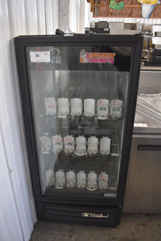 2012 True GDM-10PT Metal Commercial Single Door Reach In Pass Through Cooler Merchandiser w/ Poly Coated Racks. 115 Volts, 1 Phase. Tested and Does Not Power On