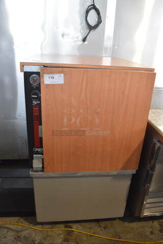 Metro C190 Heated Holding Transport Cabinet in Faux Wood Finish With Steel Shelving Racks on Commercial Casters. 120V Tested And Working