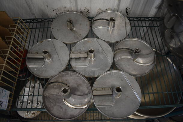 7 Various Robot Coupe Metal Food Processor Blades w/ Rack. Includes WA 5/32" GA 4, E/S 3-1/8", BR 1/8" BR 3x3, BR 5/32" BR 4x4, BR 5/64" BR 2x2. Goes GREAT w/ Lots 33 and 56! 7.5x7.5x3. 7 Times Your Bid! - Image 1 of 12