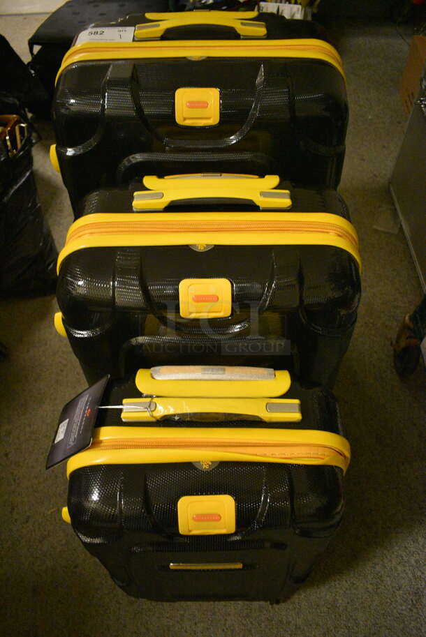 3 Piece Gabbiano Black and Yellow Hard Shell Roller Luggage Set. 3 Times Your Bid!