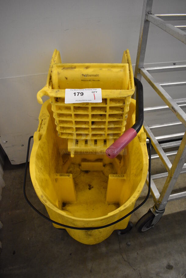Rubbermaid Yellow Poly Mop Bucket w/ Wringing Attachment on Commercial Casters. 16x22x26