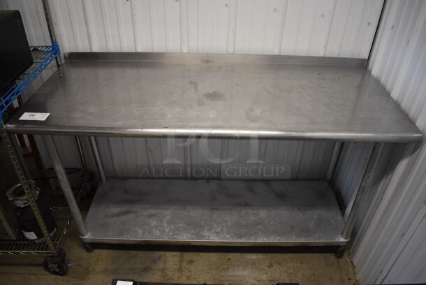 Stainless Steel Table w/ Metal Under Shelf and Back Splash. 60x24x39