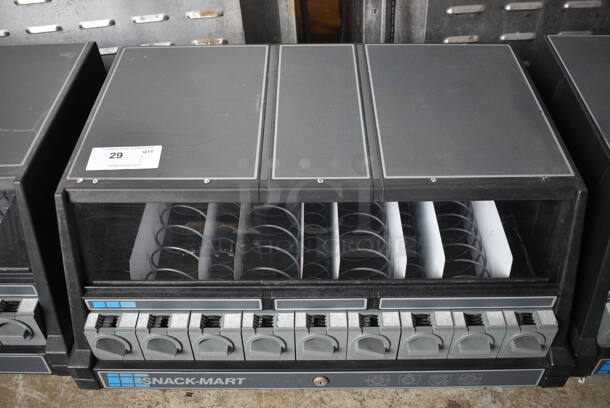 Snack-Mart Black Countertop 9 Slot Snack Vending Machine. 28x21x20.5 - Image 1 of 4
