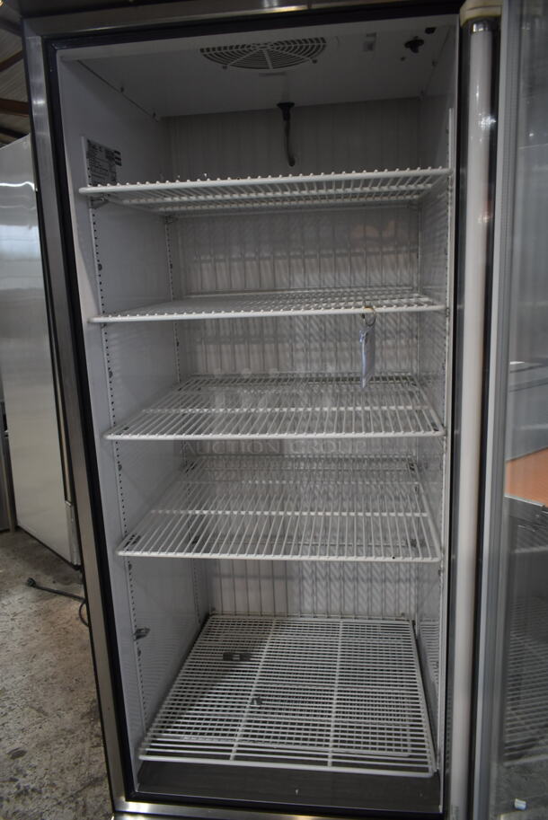 True T-23FG Stainless Steel Commercial Single Door Reach In Cooler Merchandiser w/ Poly Coated Racks on Commercial Casters. 115 Volts, 1 Phase. Tested and Powers On But Does Not Get Cold - Image 4 of 5