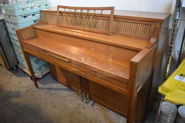 Chickering Wooden Piano. 57.5x23.5x40