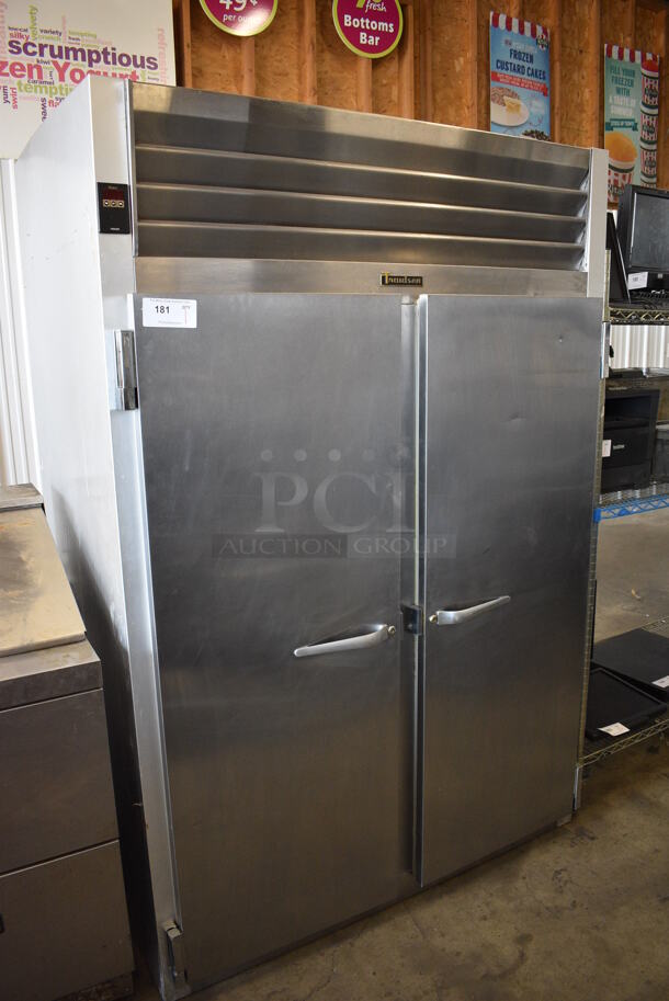 Traulsen Model G22010 Stainless Steel Commercial 2 Door Reach In Freezer w/ Poly Coated Racks. 115 Volts, 1 Phase. 52x34x78. Tested and Working!