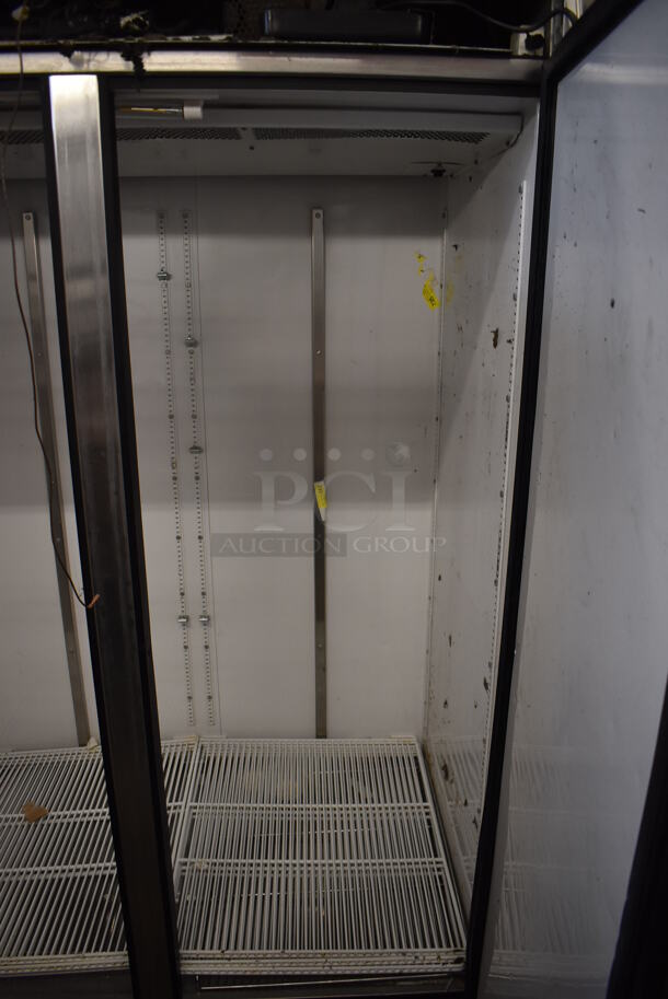 2011 True TG2F-2S Stainless Steel Commercial 2 Door Reach In Freezer w/ Poly Coated Racks on Commercial Casters. 115 Volts, 1 Phase. 51x35x83. Tested and Does Not Power On - Image 5 of 6