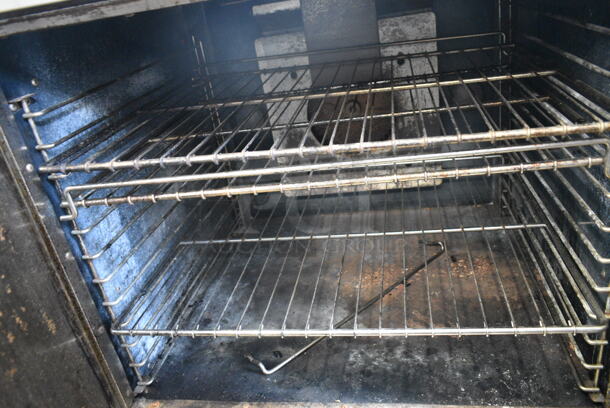 Royal Stainless Steel Commercial Gas Powered Full Size Convection Oven w/ Solid Door, View Through Door, Metal Oven Racks and Thermostatic Controls. See Pictures for Broken Glass Door.  - Image 4 of 5