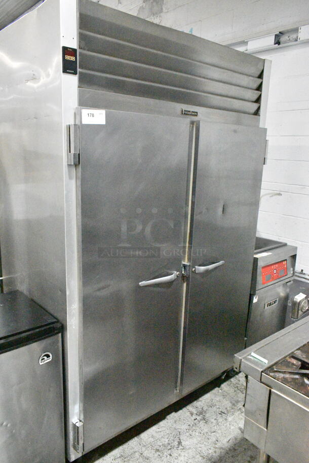 Traulsen G20010 Stainless Steel Commercial 2 Door Reach In Cooler on Commercial Casters. 115 Volts, 1 Phase. Tested and Powers On But Does Not Get Cold - Image 1 of 5