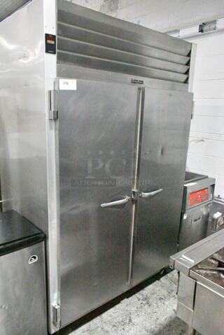Traulsen G20010 Stainless Steel Commercial 2 Door Reach In Cooler on Commercial Casters. 115 Volts, 1 Phase. Tested and Powers On But Does Not Get Cold