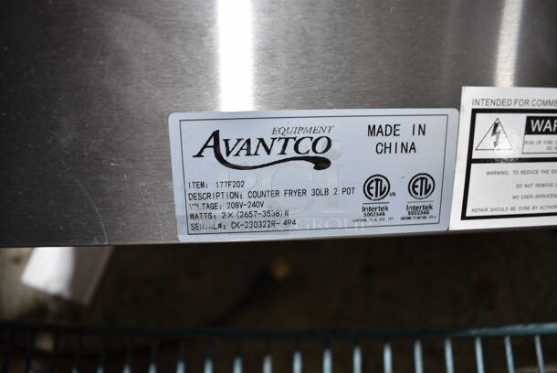 BRAND NEW SCRATCH AND DENT! 2023 Avantco 177F202 Stainless Steel Commercial Countertop Electric Powered 2 Bay Fryer w/ Lids and Metal Fry Baskets. 208-240 Volts, 1 Phase.  - Image 7 of 7
