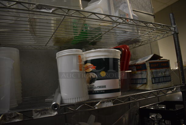 Chrome Finish 4 Tier Shelving Unit w/ Contents Including Poly Containers, Stainless Steel Bins and Stock Pot. 48x18x74. BUYER MUST REMOVE. BUYER MUST DISMANTLE. PCI CANNOT DISMANTLE FOR SHIPPING. PLEASE CONSIDER FREIGHT CHARGES. (kitchen) - Image 4 of 12