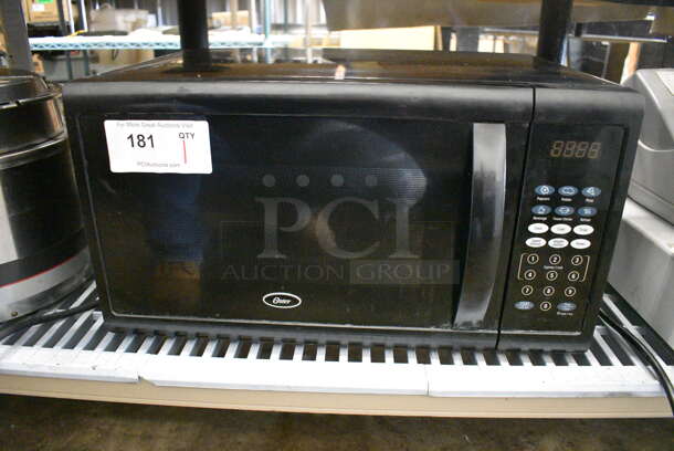Oster Countertop Microwave Oven w/ Plate. 21x15x12