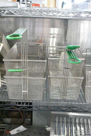 4 BRAND NEW SCRATCH AND DENT! Items Including 3698030024 Frymaster 8030024 16 3/4" x 8 3/4" x 6" Twin Size Fryer Basket, 3698030437 Frymaster 8030437 8" x 12 5/8" x 7" Dual Fryer Basket, 3698030306 Frymaster 8030306 15 7/8" x 7 5/8" x 7 3/8" Twin Size Fryer Basket, 3698030304 Frymaster 8030304 16 3/4" x 8 3/4" x 6" Twin Size Fryer Basket. 4 Times Your Bid! 