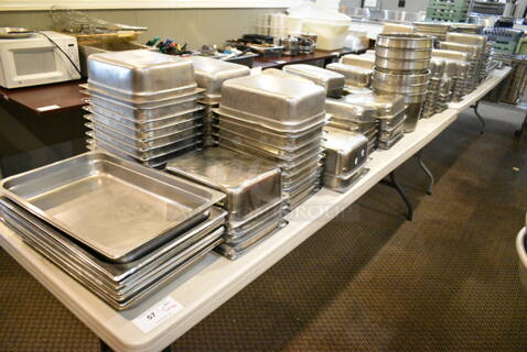 ALL ONE MONEY! Lot of Various Items Including Stainless Steel Drop In Bins, Cylindrical Drop In Bins. Does Not Include Table. (main dining room)