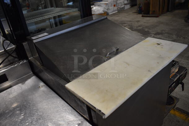 Stainless Steel Commercial Sandwich Salad Prep Table Bain Marie Mega Top w/ Various Drop In Bins and Cutting Board. 27.5x32x43. Tested and Powers On But Temps at 52 Degrees - Image 4 of 6