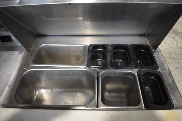 Stainless Steel Commercial Sandwich Salad Prep Table Bain Marie Mega Top w/ Various Drop In Bins and Cutting Board. 27.5x32x43. Tested and Powers On But Temps at 52 Degrees - Image 5 of 6