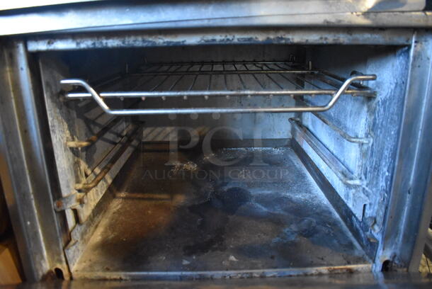 Jade Range Stainless Steel Commercial Natural Gas Powered 4 Burner Range w/ Salamander Cheese Melter, Oven and Back Splash on Commercial Casters. 24x32x76 - Image 7 of 9