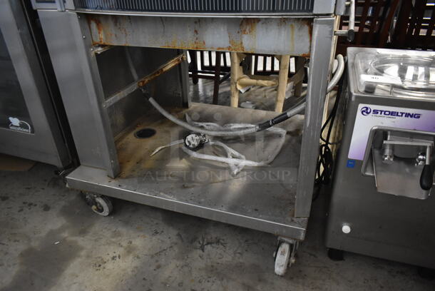Fri-jado STG7-P Stainless Steel Commercial Electric Powered Rotisserie Oven w/ Under Shelf on Commercial Casters. 208 Volts, 3 Phase.
 - Image 3 of 9