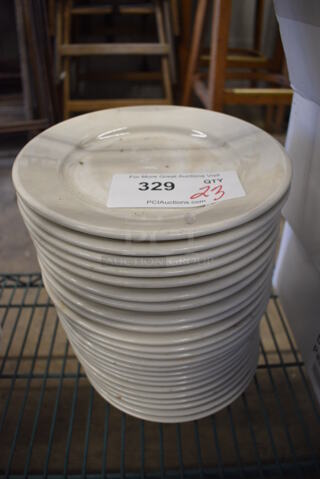 23 White Ceramic Plates. 9x9x1. 23 Times Your Bid!