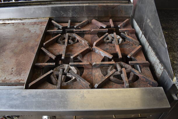 Blodgett Stainless Steel Commercial Natural Gas Powered Flat Top Griddle w/ 4 Burner Range, Gas Hose and Under Shelf on Commercial Casters. One Caster Needs To Be Reattached. 60x31x43 - Image 3 of 6