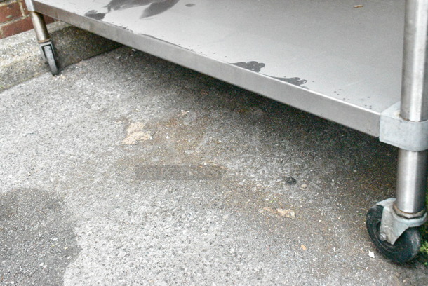 Stainless Steel Table w/ Metal Under Shelf, Drawer and Back Splash on Commercial Casters.  - Image 4 of 4