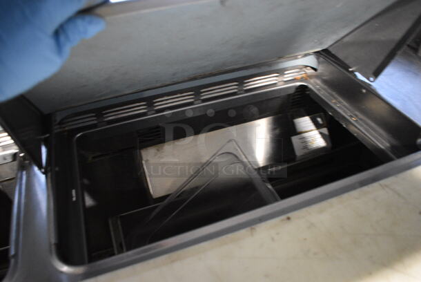 Delfield Stainless Steel Commercial Sandwich Salad Prep Table Bain Marie Mega Top w/ Cutting Board, Over Shelf and 4 Drawers on Commercial Casters. 115 Volts, 1 Phase. 65x33x55. Tested and Powers On But Temps at 49 Degrees - Image 4 of 7
