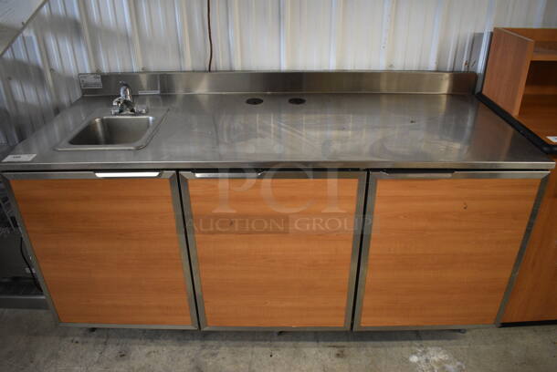 Duke Model SUBPS-72-LM Stainless Steel Commercial Counter w/ Sink Bay, Faucet, Handle, 3 Wood Pattern Doors and Backsplash. 72x30x40