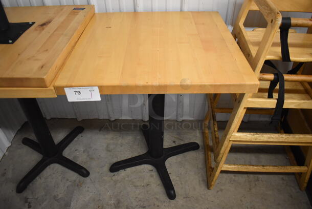 Wooden Table on Black Metal Table Base. Stock Picture - Cosmetic  Condition May Vary.  24x24x29.5