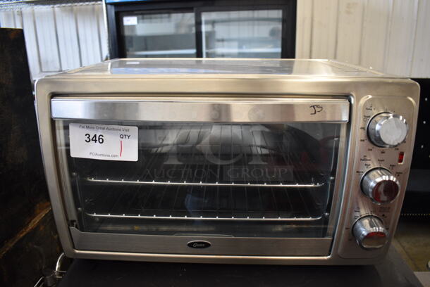 Oster Stainless Steel Countertop Electric Powered Toaster Oven. 22x16x13