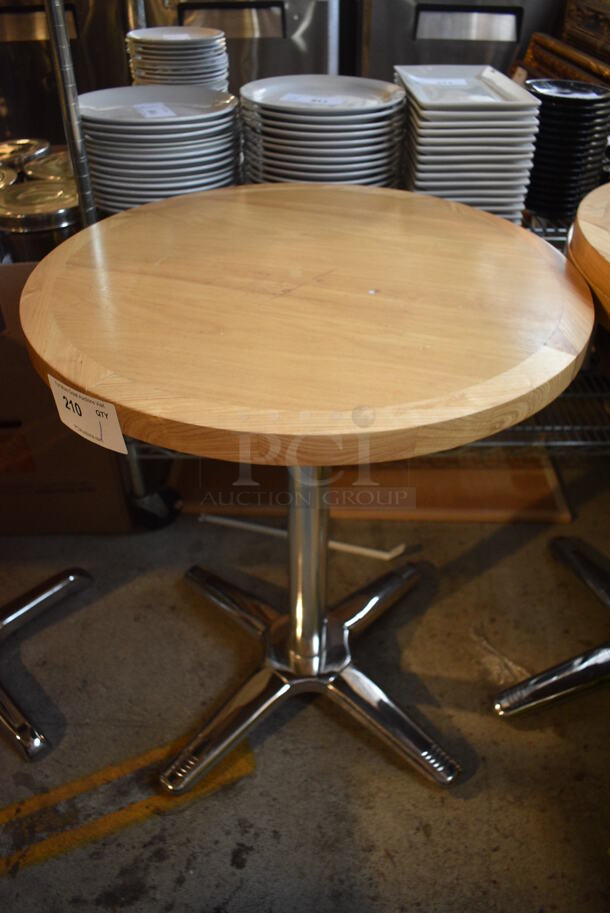 Wood Pattern Round Dining Table on Metal Table Base. Stock Picture - Cosmetic Condition May Vary. 24x24x29.5