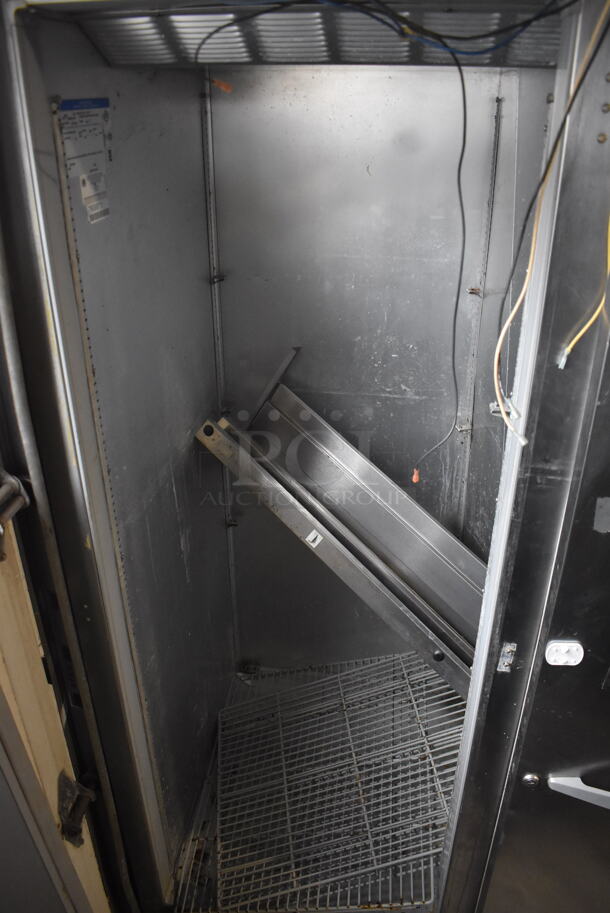 Beverage-Air ER48-1AS Commercial Stainless Steel Two-Section Solid Door Reach-In Cooler With Racks on Commercial Casters. Doors Need Reattached. 115V/1 Phase Tested And Powers On But Does Not Get Cold - Image 3 of 5