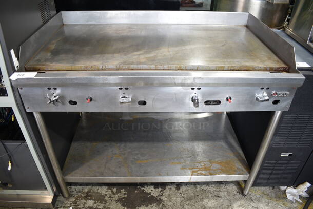 Jade Stainless Steel Commercial Natural Gas Powered Flat Top Griddle w/ Under Shelf - Image 1 of 5