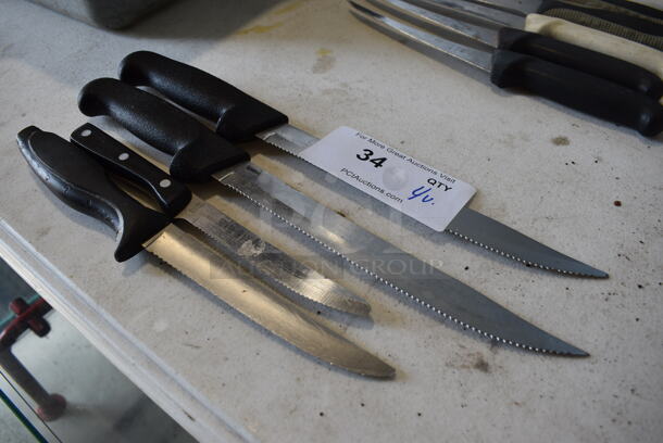 4 Various Stainless Steel Serrated Knives. Includes 14.5". 4 Times Your Bid! - Image 3 of 3